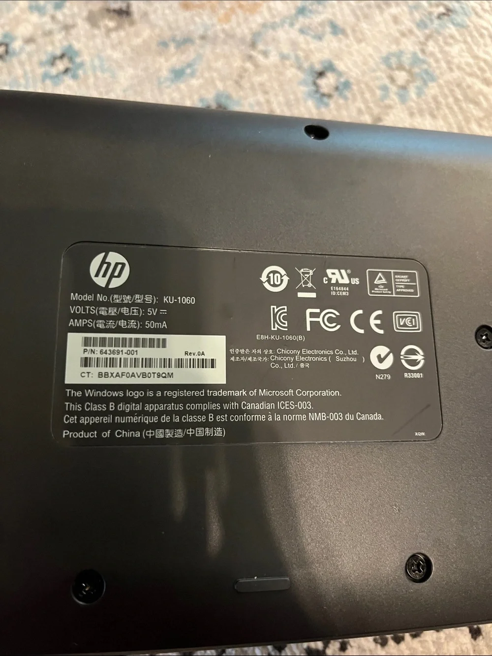 HP black keyboard model KU-1060